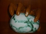 hand with egg. ornamental
